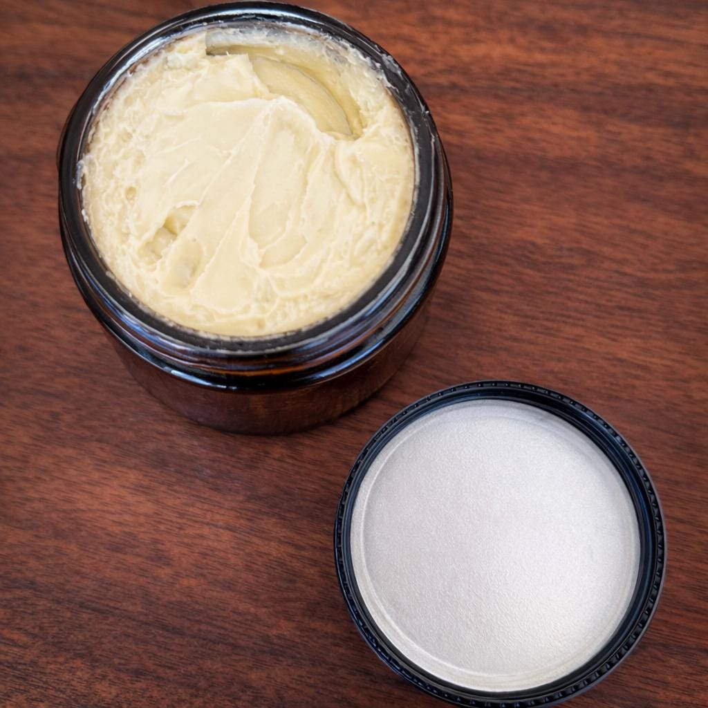 Rosemary Aloe Hair Mask in a dark jar, creamy texture visible, enriched with aloe vera and various oils.